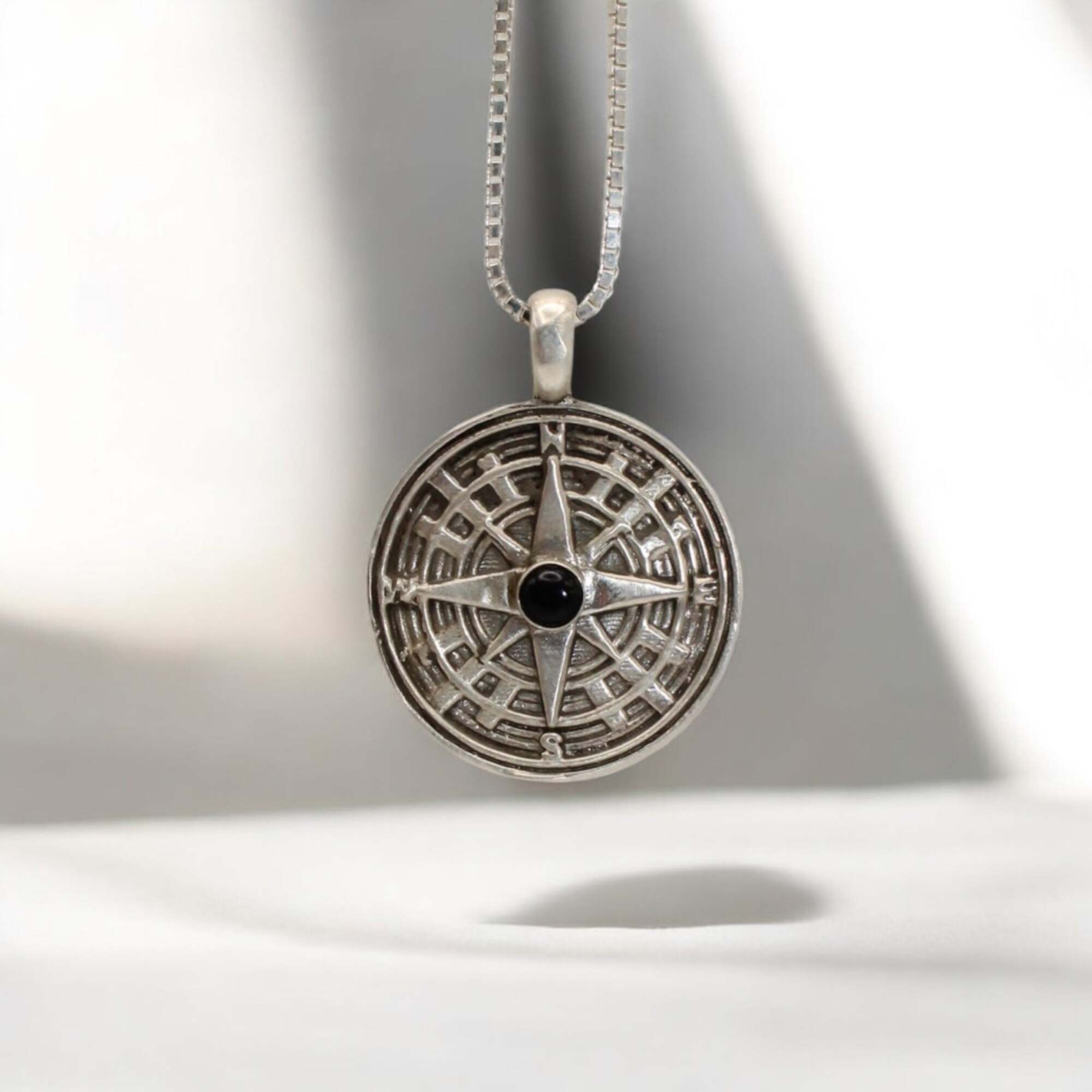 Onyx Storm Compass Pendant
